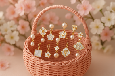 bucket of korean earrings in pink baket and flower in background